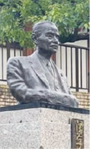 画像：初代市長 浮谷竹次郎像（全日警ホール前）