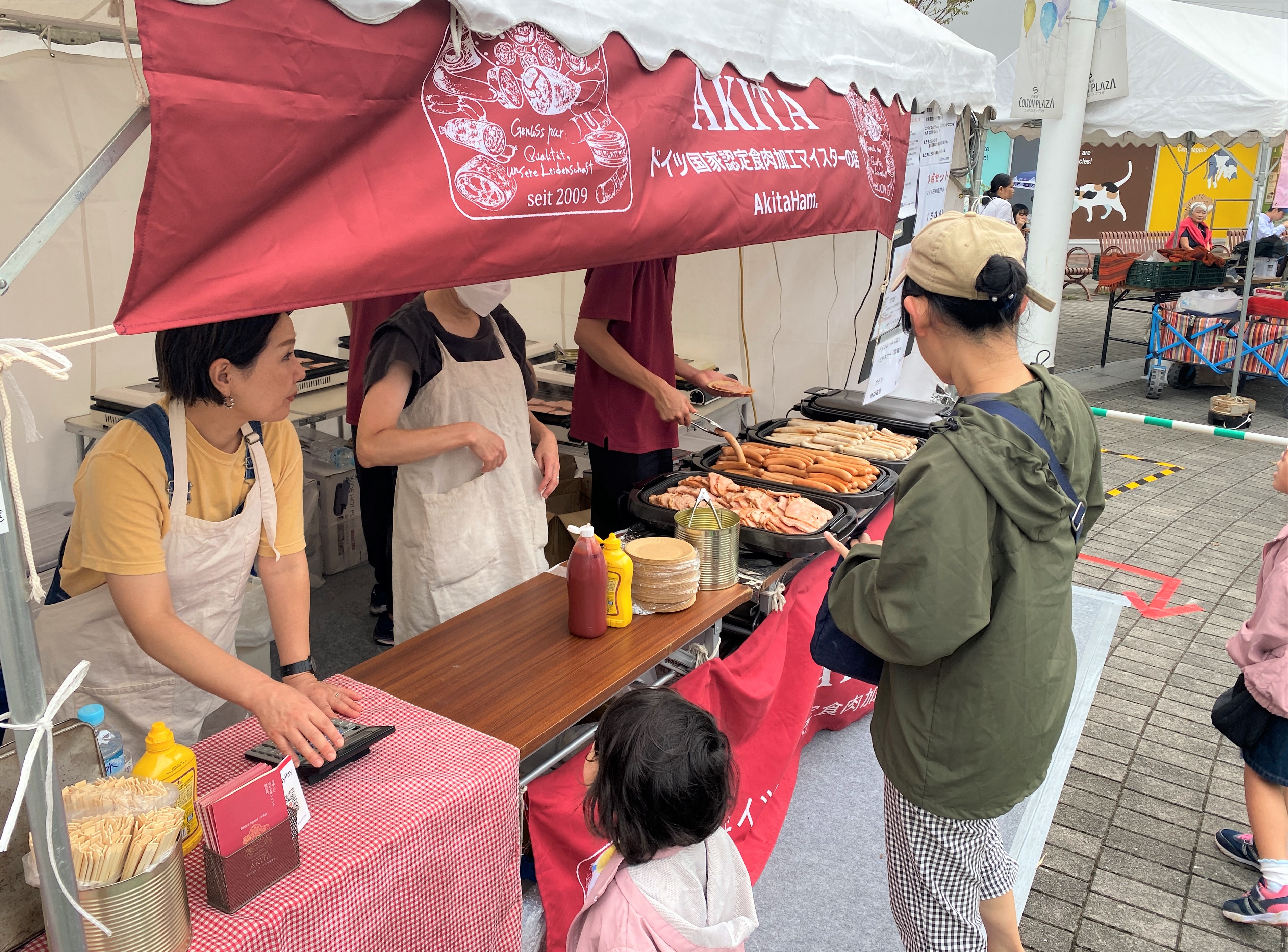 写真：出店者（ドイツソーセージ）