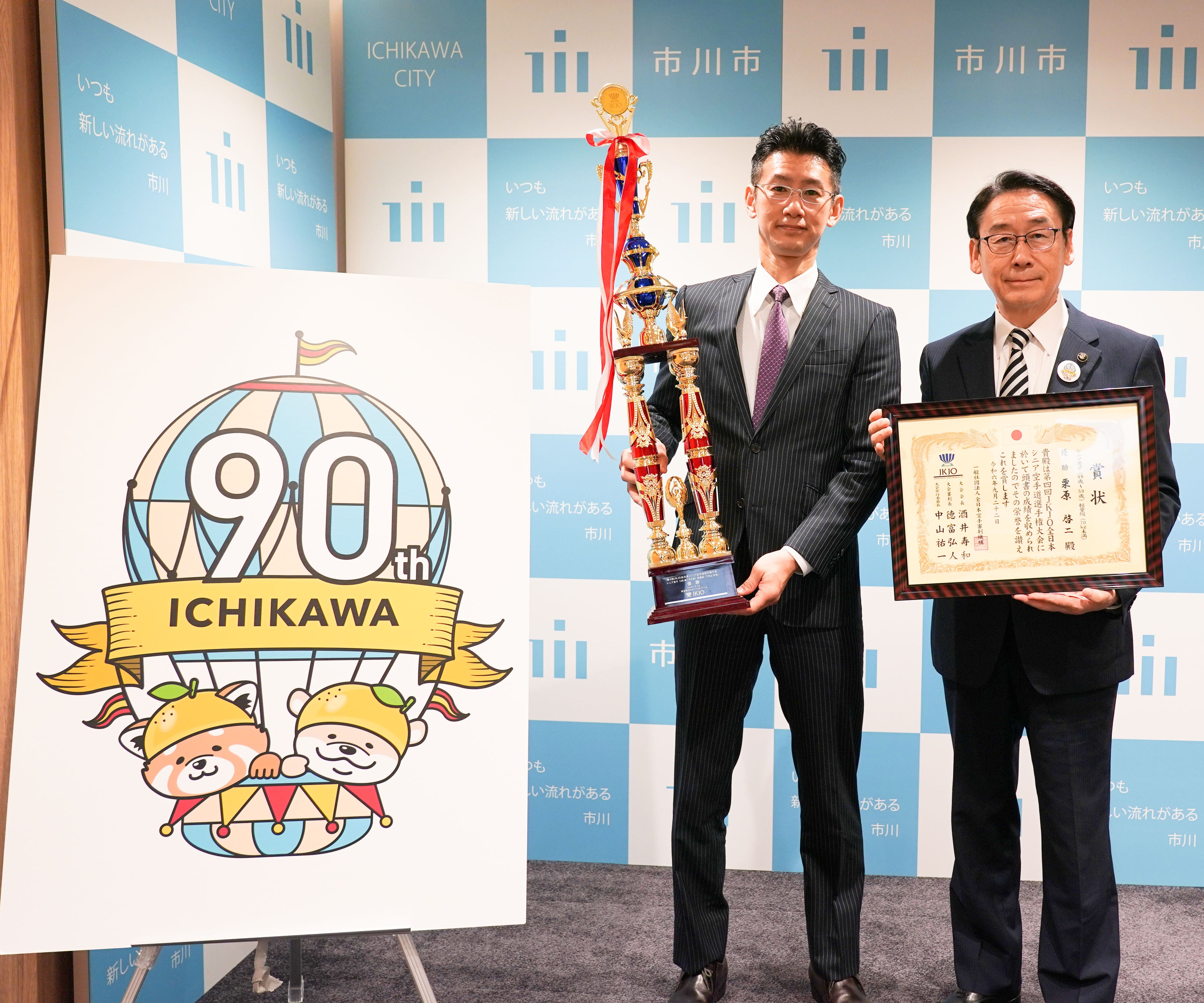 写真：田中市長と栗原選手