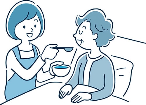 イラスト：母親が祖母にご飯を食べさせているイラスト