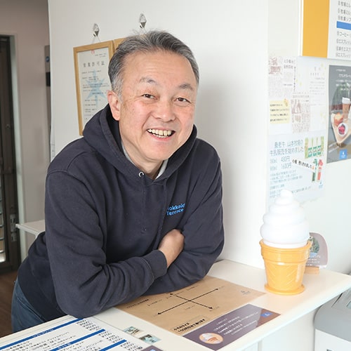 顔画像：尾﨑孝則氏