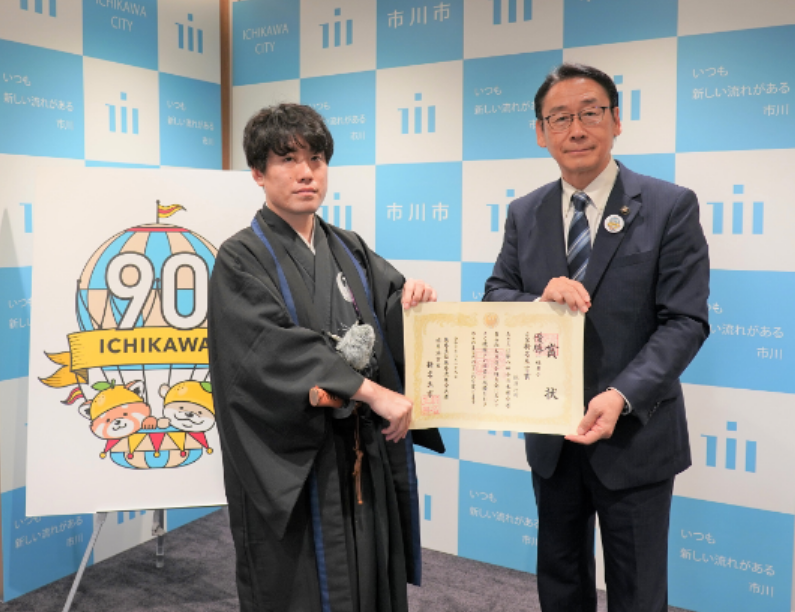 写真:田中市長と鶴澤選手